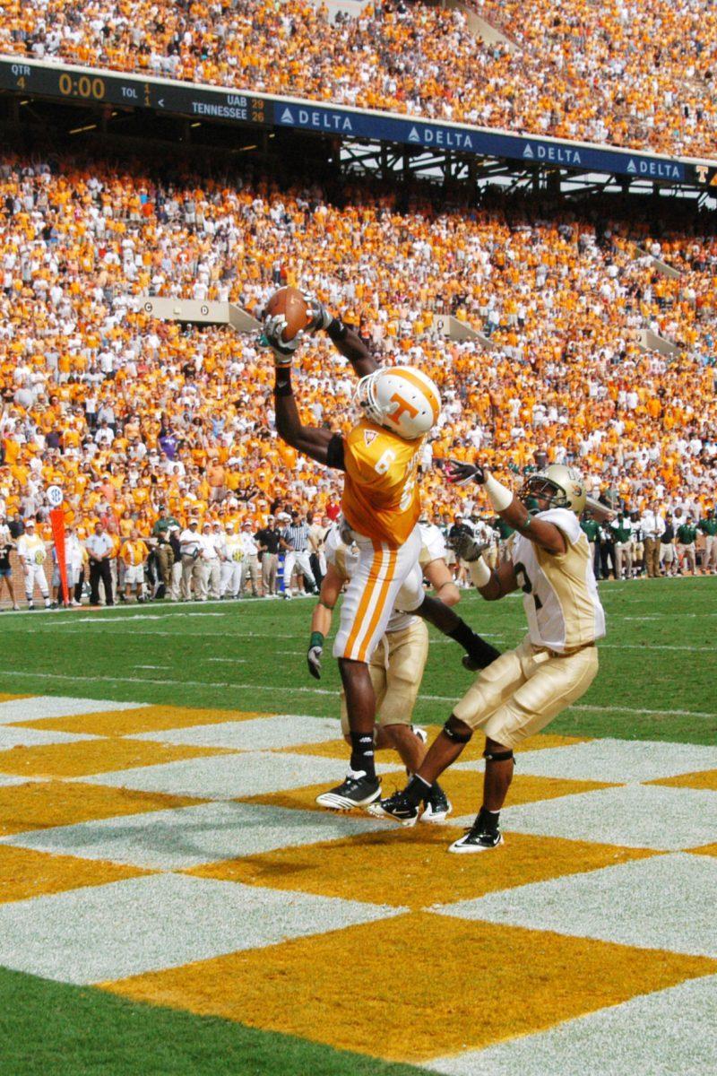 Denarius Moore hauls in the game-winning touchdown in double overtime between two UAB defenders on Saturday, Sept 25. Moore led the Vols in receiving with 68 yards and two touchdown catches.