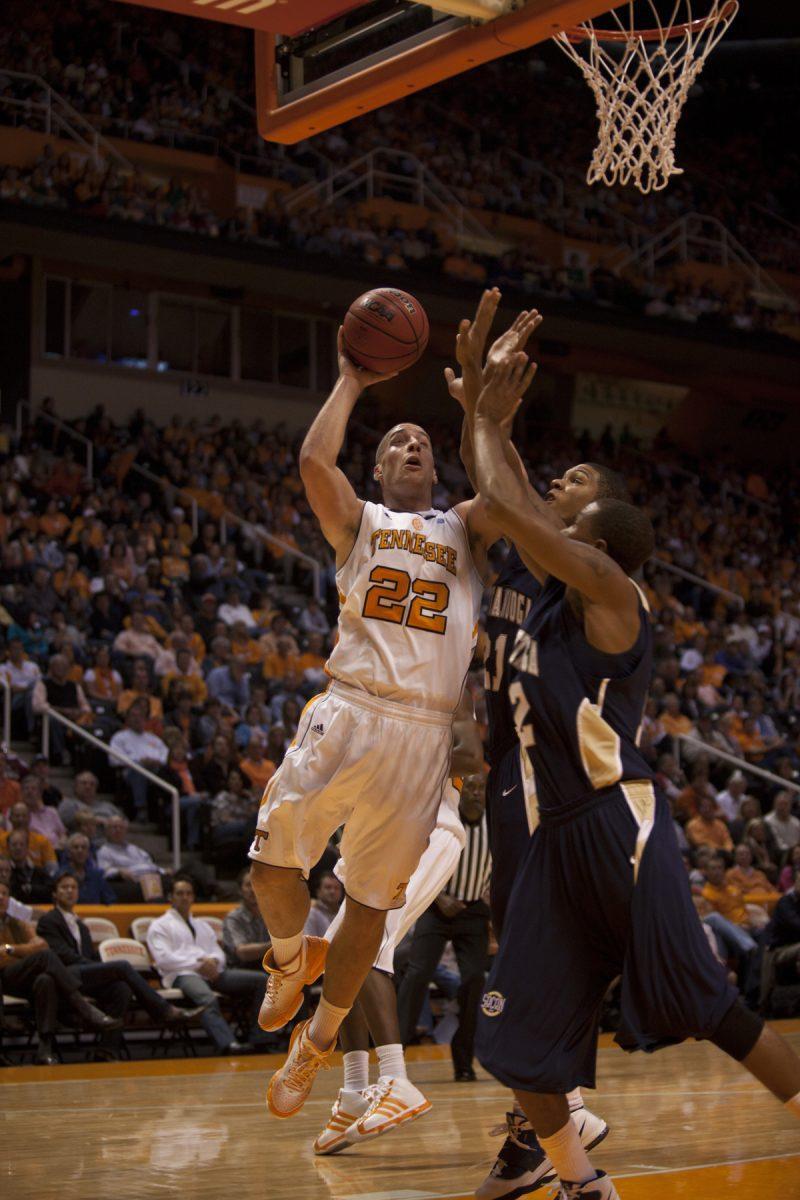 Steven Pearl attacks the basket against two Chattanooga defenders in UT's season opener on Friday, Nov. 12. The Vols advanced over Belmont in the NIT Season Tip-Off tournament and faced off against Missouri State Wednesday night for a chance to travel to the semifinals of the tournament at Madison Square Garden.