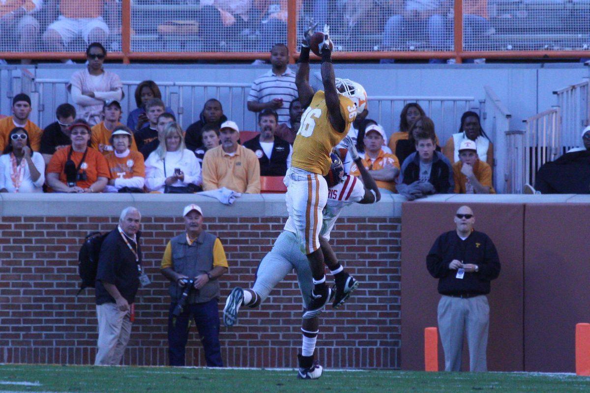 Anthony Anderson intercepts a Mississippi pass over Melvin Harris on Saturday, Nov. 13. The Vols defense snagged four interceptions on the day, running back two for touchdowns in a 52-14 win over Ole Miss.