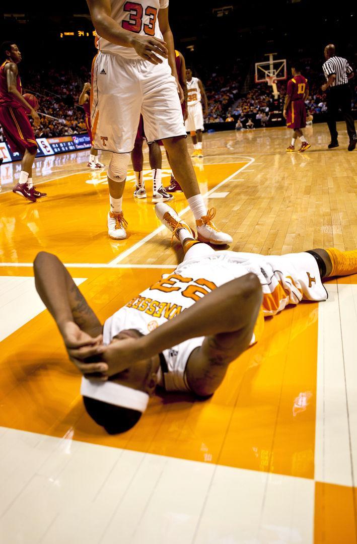 Cameron Tatum rests after taking a hard foul going to the basket against USC on Friday, Dec. 21. The game, a 65-64 loss, marked a low point in UT’s early season, as the Vols dropped three straight games against unranked opponents.
