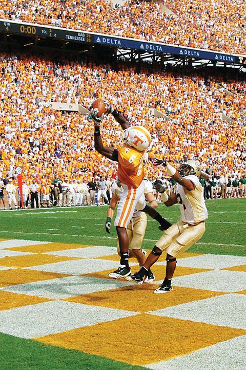 Denarius Moore hauls in the game-winning touchdown in double overtime between two UAB defenders on Saturday, Sept. 25, 2010. Moore and Luke Stocker are two former Vols who are likely to hear their names called in the NFL Draft, which starts Thursday night and runs through Saturday.