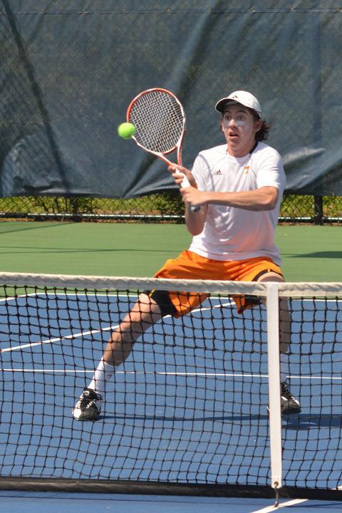 John-Patrick Smith prepares for a volley during a match against Florida on Sunday, April 10. Smith was one of three UT athletes who earned an NCAA postgraduate scholarship, which rewards students finishing their eligibility and who have excelled in the classroom.
