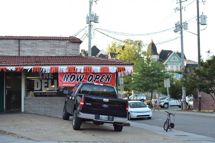 Students cross James Agee Street next to The Deli via Carousel on Monday, Aug. 29. The Deli offers a more upscale dinning experience in the Fort compared to the typical college dive.