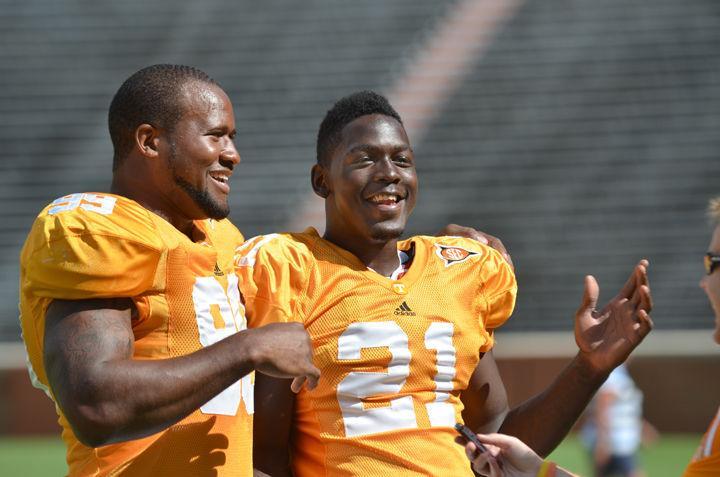 Ben Martin and Da'Rick Rogers enjoy themselves while talking with the press at Media Day on Sunday, Aug. 14. Rogers hopes to pair with high school teammate, and current Vol quarterback, Nash Nance and continue the success that lead the two to combine for over 1,600 yards in the air.