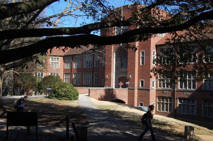 Students walk past Ferris Hall on a sunny Monday, Feb. 14. Ferris houses UT's Electrical Engineering department, which was recently awarded a $18 million endowment from the National Science Foundation and Department of Energy to go towards a new Engineering Research Center.