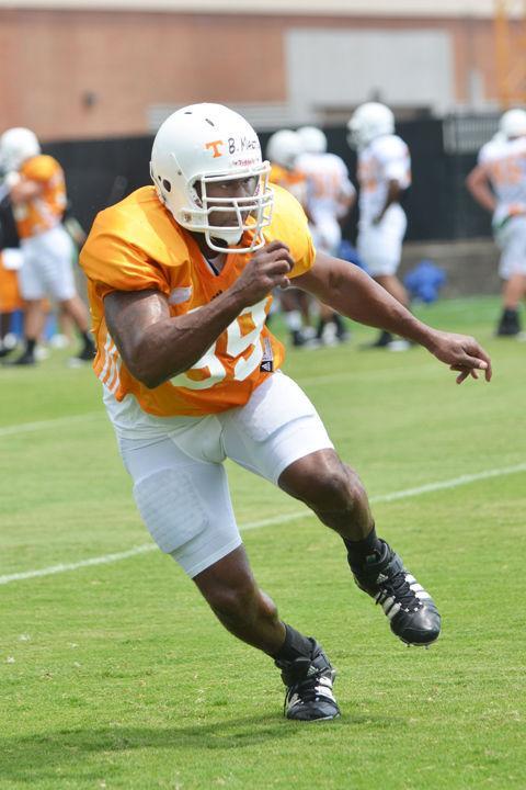Defensive lineman Ben Martin takes part in a drill at practice on Thursday, Aug. 4. Martin returns to the field after remaining sidelined since before the 2010 season with an Achilles tear.