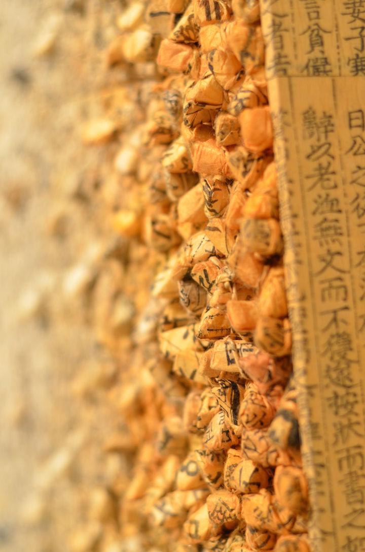 Thousands of small pieces of traditional parchment make up a piece of artwork in "Aggregations" by Kwang-Young Chun in the Knoxville Museum of Art on Tuesday, Aug. 30. Chun is world-renowned for his use of individual, small pieces that come together to form a whole.