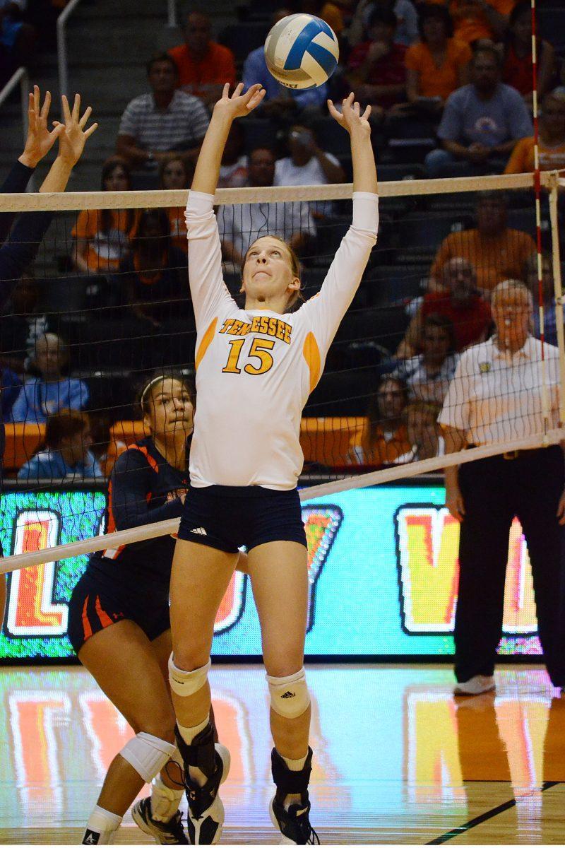 Mary Pollmiller prepares to set the ball against Auburn on Sept. 18. The freshman has 785 assists this season and has helped outside hitter Kelsey Robinson with her 375 kills.