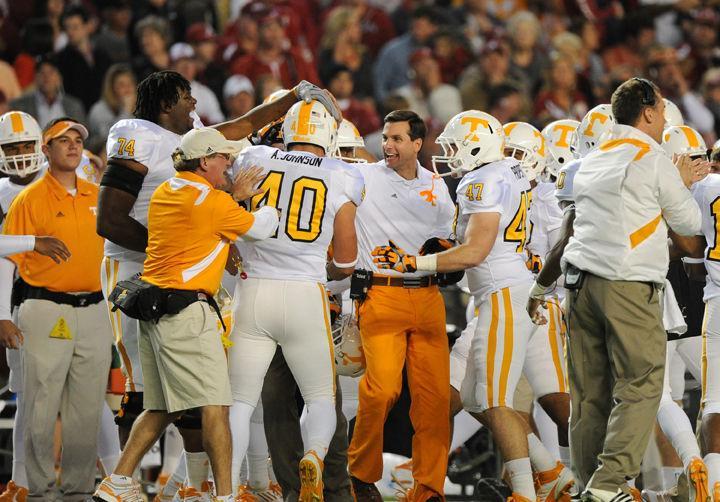 Derek Dooley celebrates with Austin Johnson after a defensive stand during a game against Alabama on Saturday, Oct. 22. Although Johnson tallied 13 tackles in the game — a total only bested by Eric Berry — and the game was tied 6-6 at halftime, the Vols were unable to keep the pace, allowing 21 points in the third quarter as the Tide went on to a 37-6 victory.