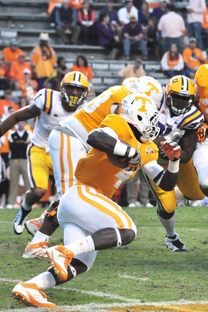 Freshman tailback Marlin Lane Jr. runs the ball against LSU on Oct. 15. Lane gained 43 yards on 6 runs, marking his season high. Lane has a season total of 139 yards with two touchdowns.