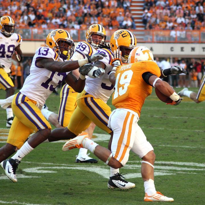 Devrin Young runs out a punt, heavily pursued by defenders during a game against LSU on Saturday, Oct. 15. Despite strong play in the first half, the Volunteers were unable to keep up the effort, falling to the Tigers 38-7 while dropping to 0-3 in SEC play.
