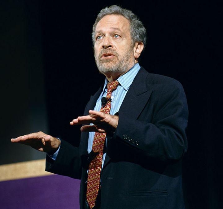 University of California Berkley Professor Robert Reich speaks with students during a presentation at Northwestern University in 2005. Reich joined the UC-Berkley hosted webcast for Teach-In, a national discussion between students and university staff about workers’ rights issues and the importance of student action.