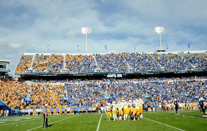 Tennessee players huddle together before a play during a game against Kentucky on Saturday, Nov. 26. The Vols dropped the game 10-7, giving the Wildcats their first win over UT since the 1984 season.