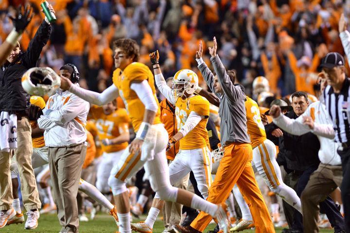 Derek Dooley and the entire football team take the field in victory after officials overturned a play at the conclusion of overtime of a game against Vanderbilt on Saturday, Nov. 20. Eric Gordon ended the game with a 90-yard interception return during overtime to give the Vols their first SEC win, 27-21.