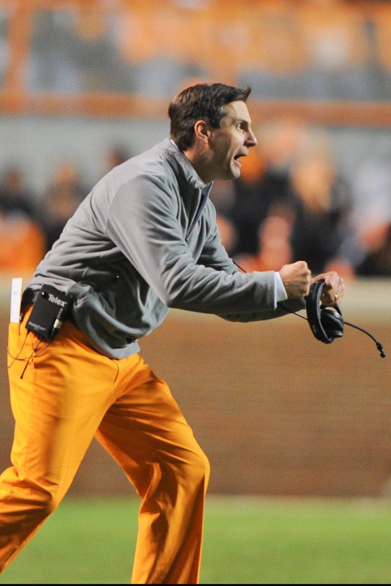 Tennessee coach Derek Dooley tries to motivate the Volunteers against South Carolina on Oct. 29. Dooley has been the topic of debate throughout the season with the Volunteers’ 4-6 record. Trying to cheer up the team, Dooley brought a bright orange ceramic dog to practices.