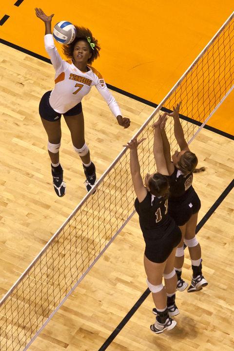 Tiffany Baker prepares to crush a shot past two Mississippi State blockers during a match in Thompson-Boling Arena on Sunday, Nov. 6. The Lady Vols will face Kentucky in their last home game and final match of the regular season, on Wednesday at 7 p.m.