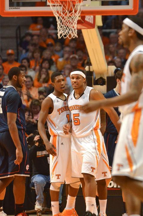 Jarnell Stokes celebrates with Josh Richardson after a basket and foul against Connecticut on Saturday, Jan. 21. Stokes, in his first start at UT, pulled in his first double-double to help lead the Vols over the 13th-ranked Huskies in a 60-57 victory.