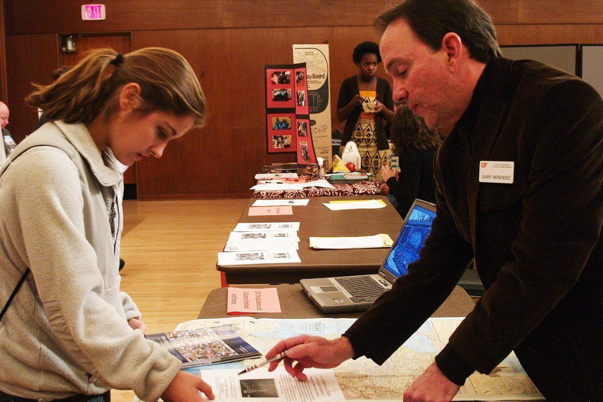 Kelly Carter, junior in kinesiology, speaks with a representative during the Study Abroad Fair on Jan. 26, 2011. The fair this semester takes place Jan. 25 from 10 a.m.-3 p.m.