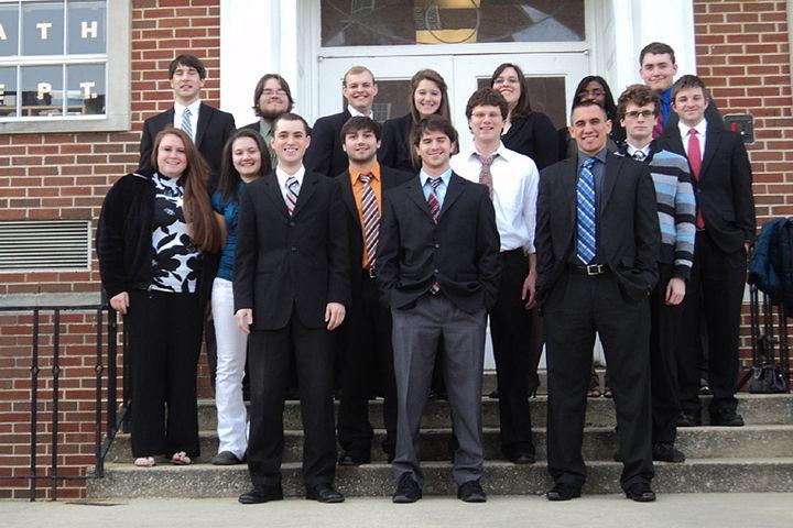 Students in the UT Speech and Debate Society stand outside of competition for the Tennessee Intercollegiate Forensics Association State tournament, where the team placed third overall in only a single day of competition.