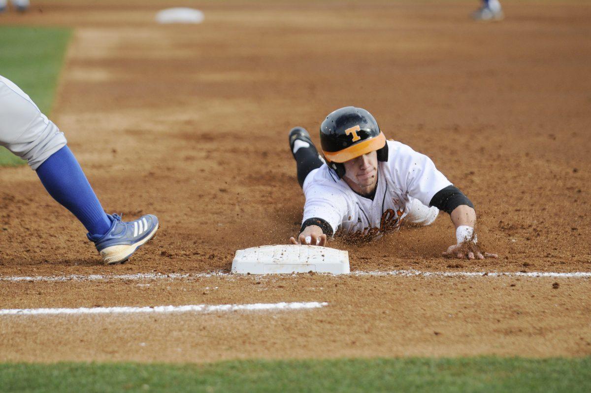 A player slides back into home against Seton Hall on Friday. The Diamond Vols swept the series against Seton Hall and are 7-0 for the season.