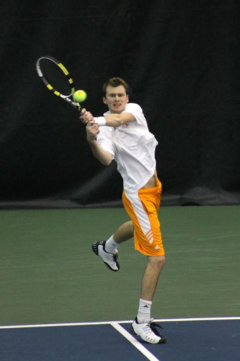 Peter Nagovnak rips a shot back during a match against Illinois on Sunday, Feb. 5. The Vols were dealt their first loss in five matches against the Fighting Illini, 4-1.