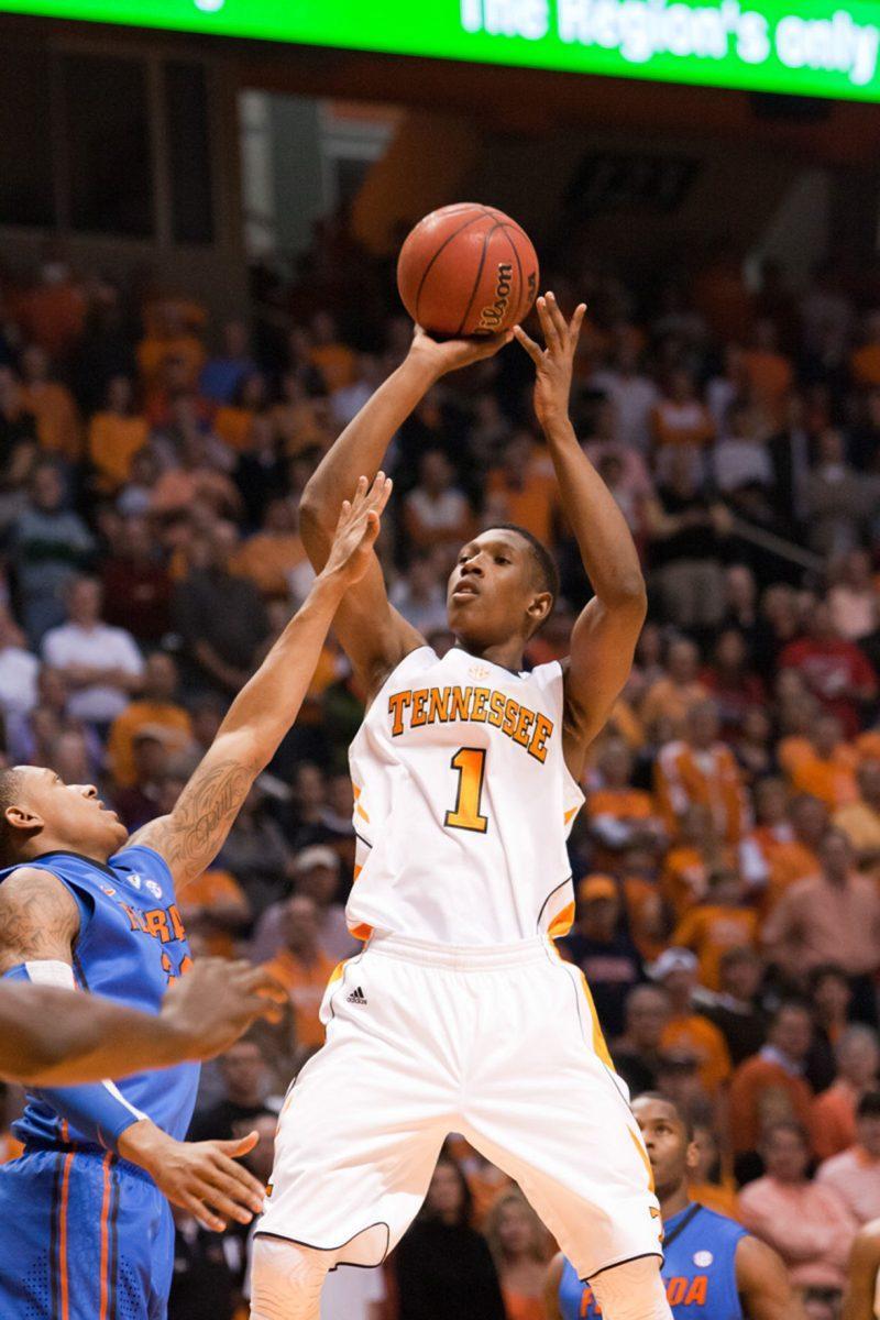 Josh Richardson pulls up for a shot over a Florida defender during a game on Saturday, Jan. 7. Richardson has earned a good deal of playing time in his freshman season due to his versatility and strength on the defensive end of the court.