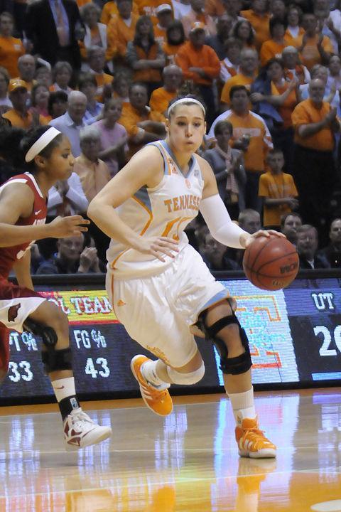 Taber Spani drives in the paint past an Arkansas defender during a game Feb. 23. Spani has been a positive leader for the Lady Vols on and off the court, gaining the respect and admiration of her fellow players, coaches and fans.