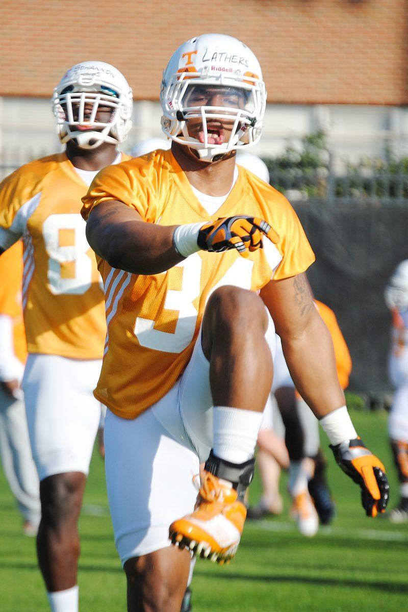 Linebacker Herman Lathers warms up during spring practice on Sunday. The senior did not play last season due to a fractured ankle that happened in June 2011.