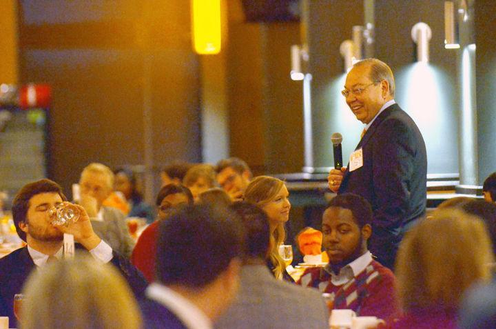 Jimmy Cheek laughs while taking questions at the Student Leadership Dinner on Monday, Feb. 20. Cheek met with the Honors Council for another Q&amp;A session to continue open communications between students and the UT administration.