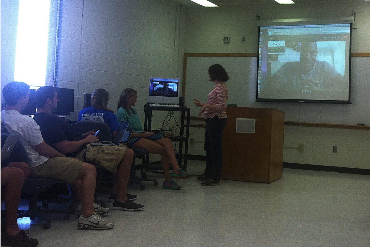Students in Dr. Amber Roessner’s JEM 475 class prepare to interview Tennessee Titans linebacker Will Witherspoon on Tuesday via Skype. The NFL player answered the classes’ questions on various topics for over 30 minutes.