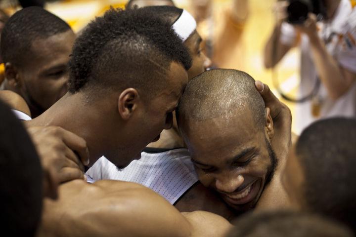 Trae Golden and Renaldo Woolridge celebrate after a win over Vanderbilt on Saturday. The men's basketball team closed out the regular season with a Senior Day victory over the Commodores, 68-61, to secure a No. 2 seed in the SEC Tournament.