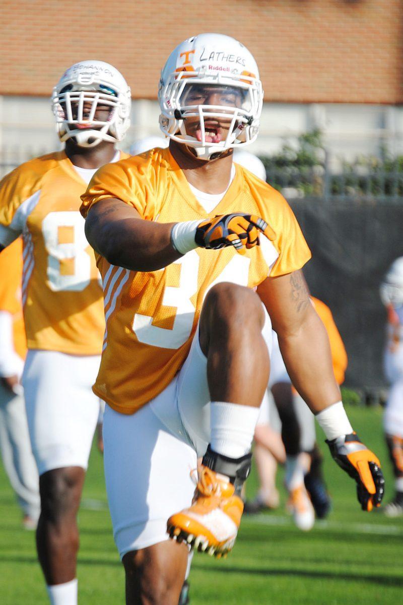 Linebacker Herman Lathers warms up during spring practice on Sunday. The senior did not play last season due to a fractured ankle that happened in June 2011.