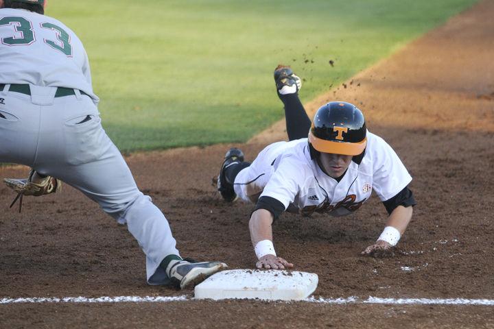Parker Wormsley dives back to first base during a game against Mississippi Valley State on Tuesday, March 27.