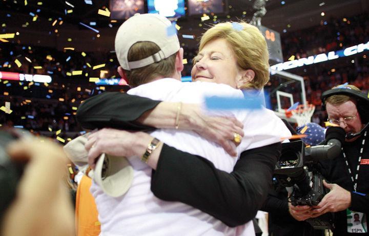 Pat Summitt hugs son, Tyler, after winning the D1 NCAA Women's Basketball Championship in 2007.
