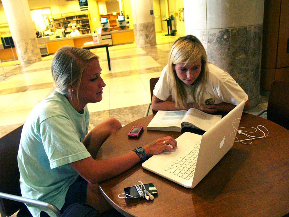 Students study outside Starbucks in Hodges Library in Aug. 2010. The library will be busier as it gets closer to finals week.