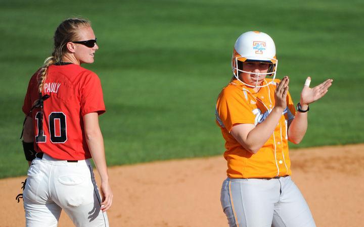 Melissa Brown applauds after reaching second base during a game against Georgia on Wednesday. Brown comes from a long lineage of baseball players, noting that the support and common bond helped her mature as both a player and a person.