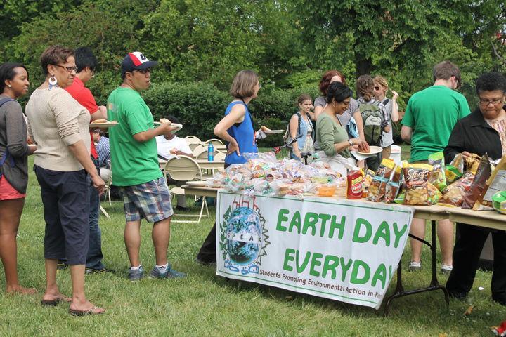 UT students and staff gather for food at an Earth Day event on Friday. On Tuesday, members of UT met to discuss the impact of a revolving fund on energy efficiency on campus.