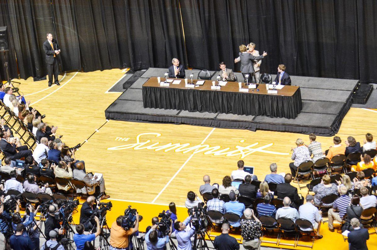 Pat Summitt and Holly Warlick hug during the press conference for Summitt on Thursday.