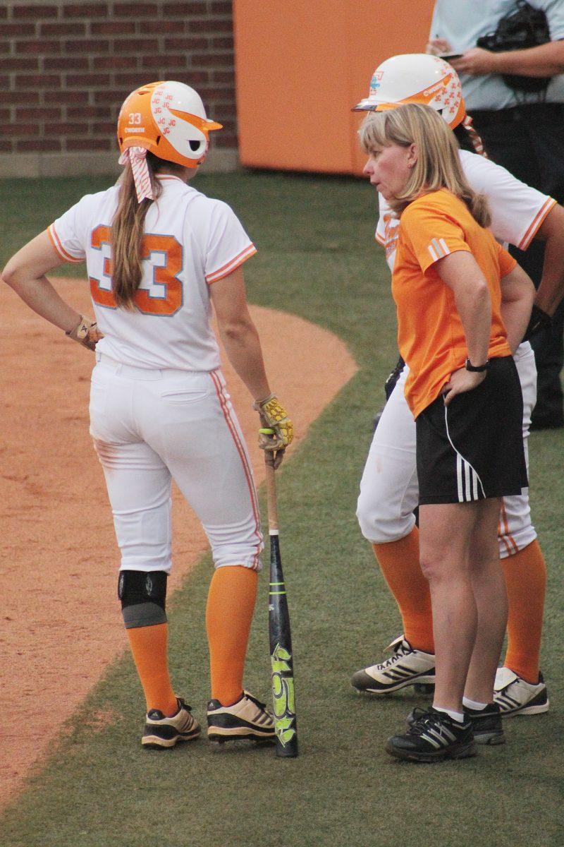 Kat Dotson, junior outfielder, talks to Karen Weekly during the Miami (Ohio) game May 19.