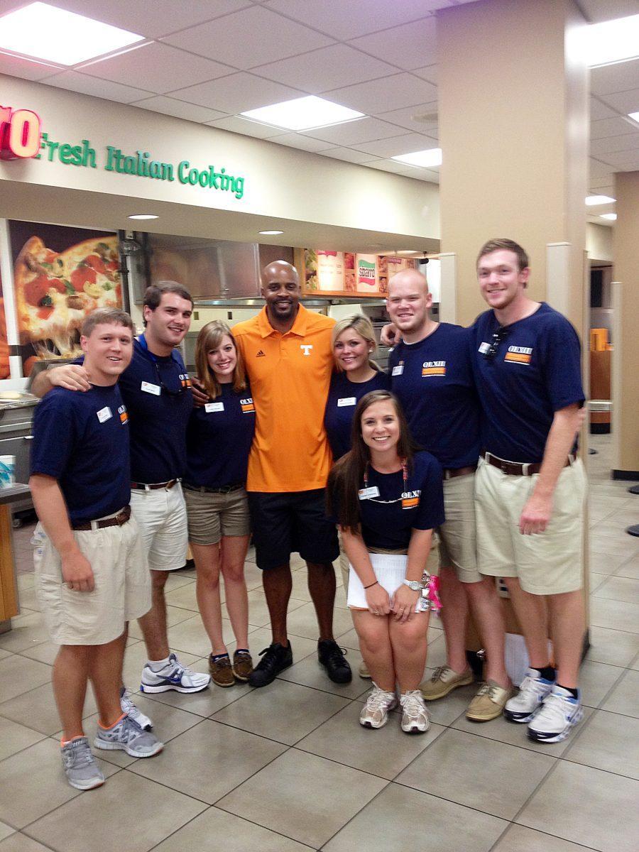 Orientation leaders smile with Cuonzo Martin in this undated picture. Orientation Leaders are responsible for creating a perfect environment for incoming freshman to be familiarized with campus. The students take the time during their two days at UT to meet other students, learn about organizations on campus, and be advised for their first semester in the fall.