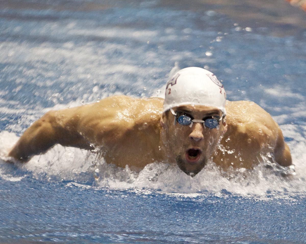 Michael Phelps perfects his butterfly stroke at Allan Jones Aquatic Center Thursday. Phelps and the rest of the US Olympic swim team have practiced on-campus for the past week.