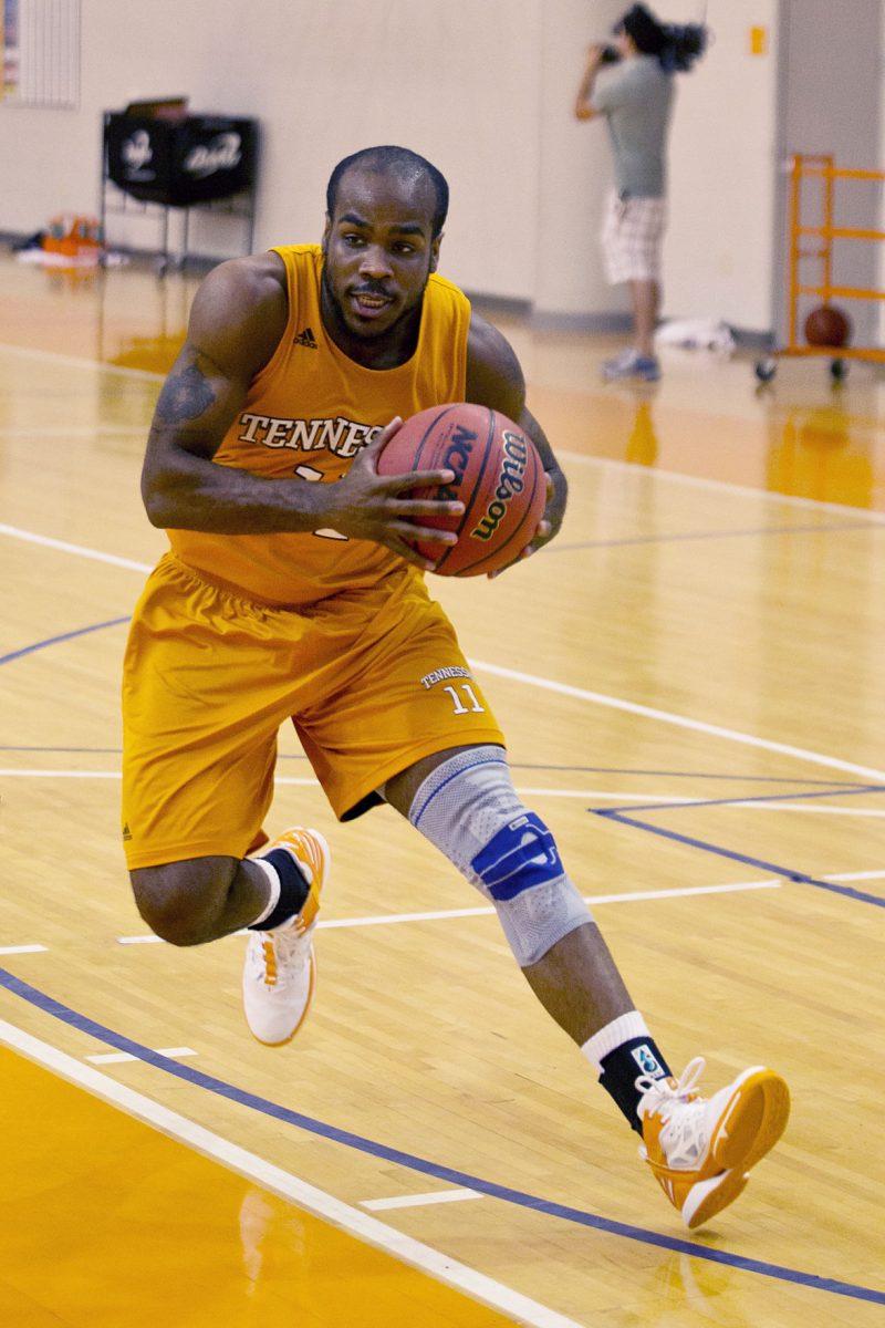 Guard Trae Golden prepares for a layup during open practice on July 31.