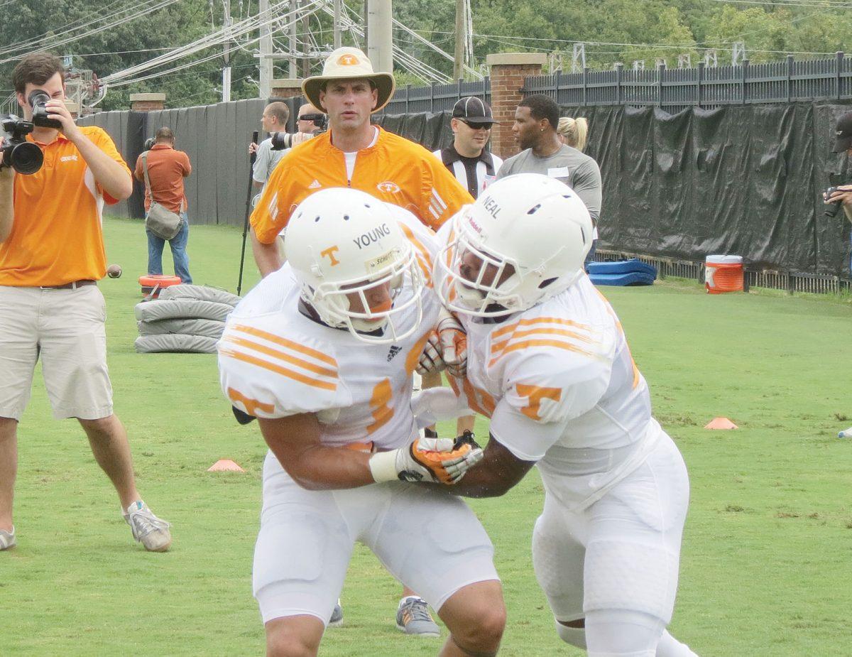 Dooley watches football summer practice
