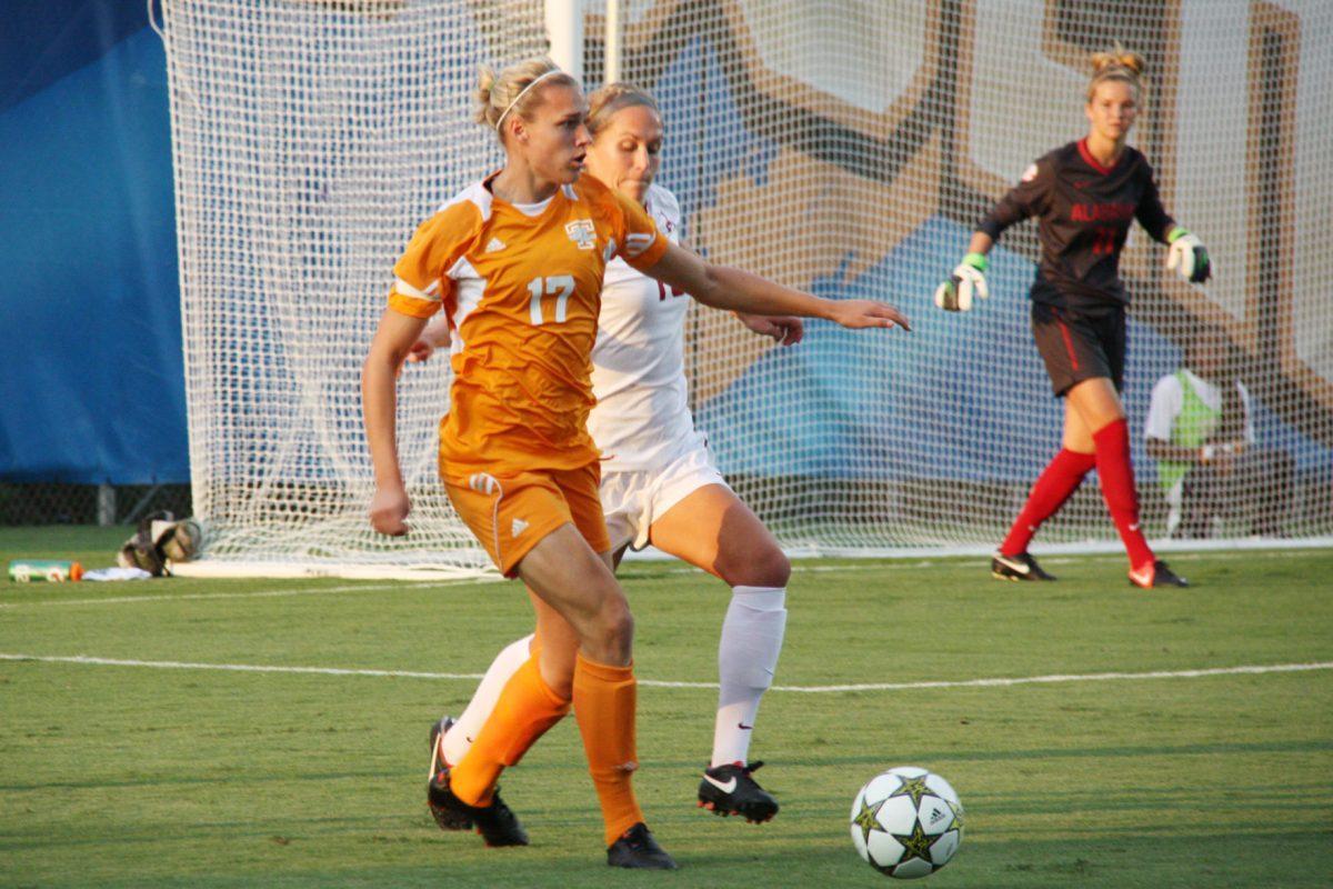 Forward Hannah Wilkinson looks to pass to an open player during the Alabama game on Sept. 14. Wilkinson participated in the 2012 Olympics for New Zealand.