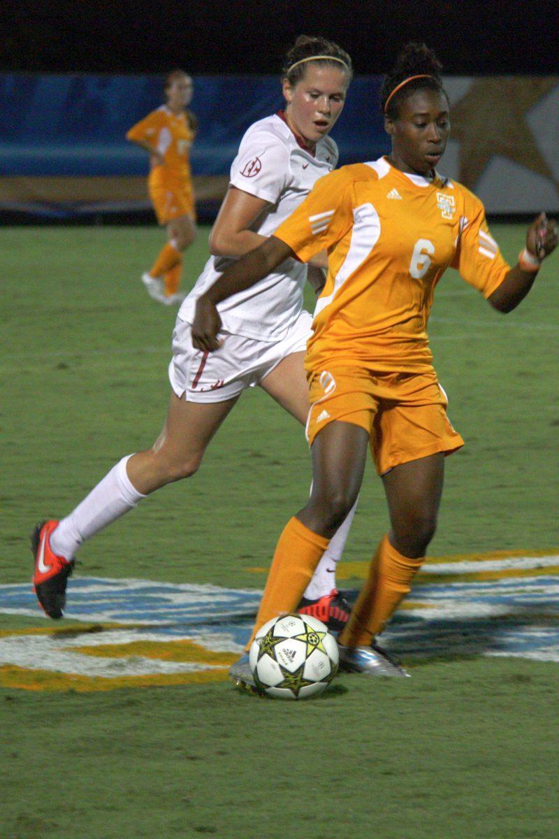 Iyana Moore runs the ball downfield against Alabama on Sept. 14.