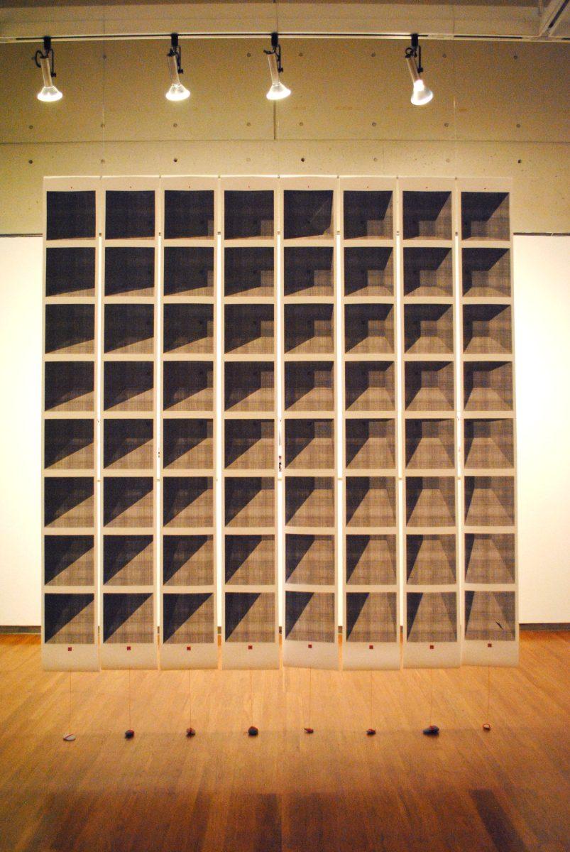 A hanging piece grids out multiple progressions in a space in Ewing Gallery as part of the "Confabulatores Nocturni" and "Limited Vision" exhibits on Aug. 28.