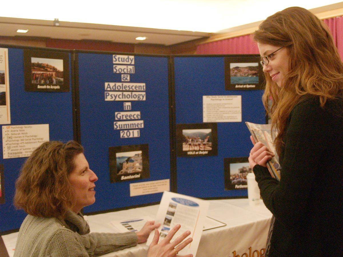 Shelby Hall, a kinesiology sophomore, talks to a Study Aborad representative at the Study Abroad Fair on Jan. 27, 2012.