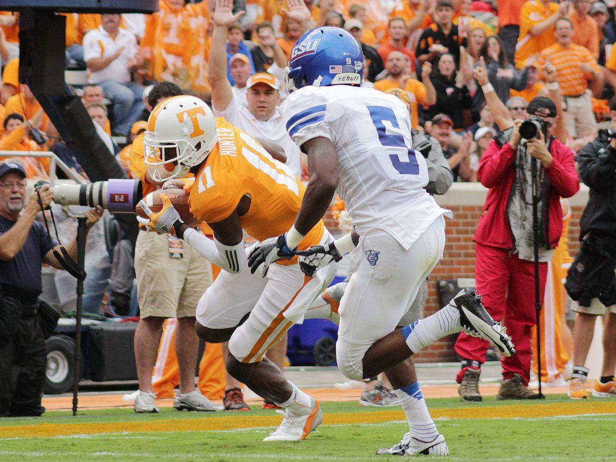 Wide reciever Justin Hunter runs past a Georgia State defender into the end zone on Sept. 8.
