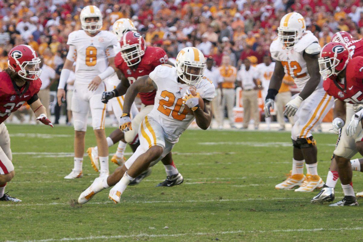 Rajion Neal runs through a break against the Bulldogs on Sept. 29.