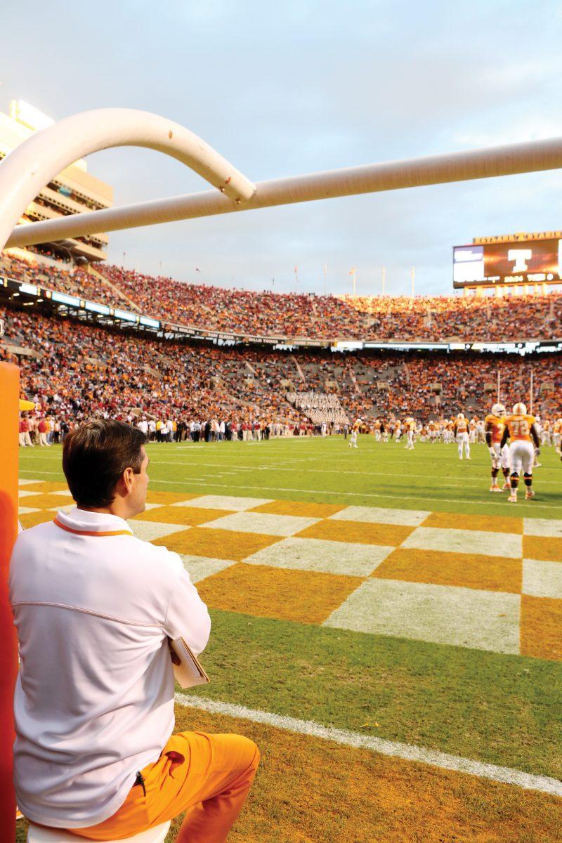 Head coach Derek Dooley overlooks warm-ups before the Alabama game on Oct. 20. Dooley coached the Miss. State from the press box but decided to stay on the sideline with crutches for Saturday’s game.